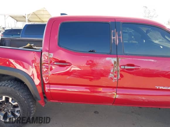 2021 Toyota Tacoma SR z VIN 5TFCZ5AN0MX262902, wystawiony jako IAAI lot #43535009 z przebiegiem 70 926 mil mil oraz . Historia ofert i sprzedaży dostępna na DreamBid. Obrazek 16.