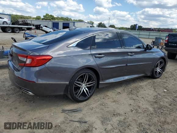 2021 Honda Accord Touring с VIN 1HGCV2F90MA022372, выставлен на аукционе Copart как лот 69996705 с пробегом 70 742 миль миль и Списание • Salvage title. История ставок и продаж доступна на DreamBid. Изображение 3.