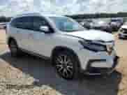 2020 Honda Pilot Touring 8-Passenger z VIN 5FNYF5H94LB011994, wystawiony jako Copart lot #56168045 z przebiegiem 91 737 mil mil oraz Szkoda całkowita • Salvage title. Historia ofert i sprzedaży dostępna na DreamBid. Obrazek 4.