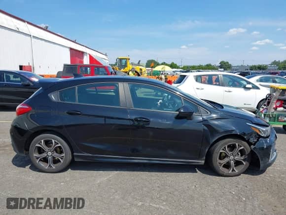 2019 Chevrolet Cruze LT z VIN 3G1BE6SM0KS529689, wystawiony jako IAAI lot #42519148 z przebiegiem 93 574 mil mil oraz . Historia ofert i sprzedaży dostępna na DreamBid. Obrazek 13.