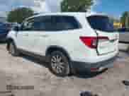 2021 Honda Pilot EX-L z VIN 5FNYF5H59MB017028, wystawiony jako IAAI lot #42580843 z przebiegiem 61 557 mil mil oraz . Historia ofert i sprzedaży dostępna na DreamBid. Obrazek 3.