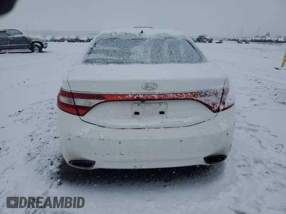 2013 Hyundai Azera z VIN KMHFH4JG5DA284078, wystawiony jako Copart lot #84546694 z przebiegiem 122 111 mil mil oraz Szkoda całkowita • Salvage title. Historia ofert i sprzedaży dostępna na DreamBid. Obrazek 6.