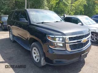 2015 Chevrolet Tahoe Commercial with VIN 1GNSK3EC2FR672807, listed as a IAAI auction lot 42749143 with 91,176 mi miles and . Bid and sale history available at DreamBid. Image 1.