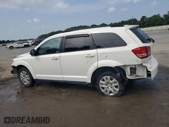 2016 Dodge Journey SE с VIN 3C4PDCAB5GT118059, выставлен на аукционе Copart как лот 63050045 с пробегом 190 284 миль миль и Списание • Salvage title. История ставок и продаж доступна на DreamBid. Изображение 2.