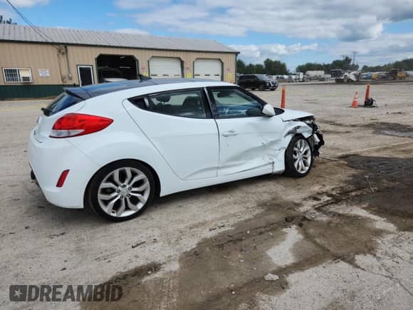 2015 Hyundai Veloster with VIN KMHTC6AD3FU229648, listed as a Copart auction lot 69972395 with 107,024 mi miles and Salvage title. Bid and sale history available at DreamBid. Image 3.