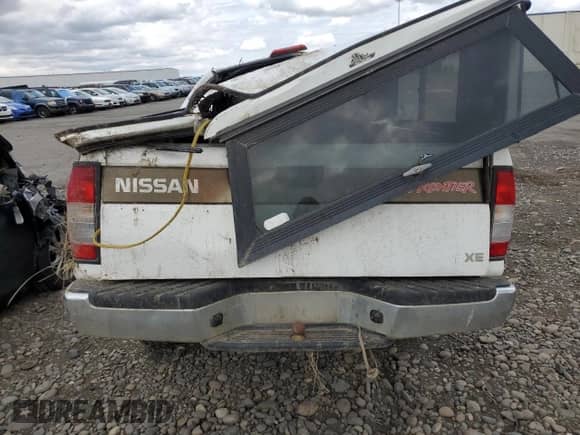 1998 Nissan Frontier XE with VIN 1N6DD26Y2WC387704, listed as a Copart auction lot 58180355 with Not provided miles and Salvage title. Bid and sale history available at DreamBid. Image 6.