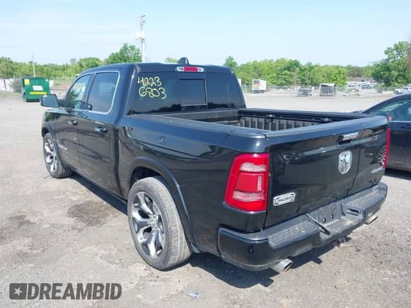 2020 Ram 1500 Longhorn with VIN 1C6SRFKT5LN117418, listed as a IAAI auction lot 42236803 with 96,338 mi miles and . Bid and sale history available at DreamBid. Image 3.