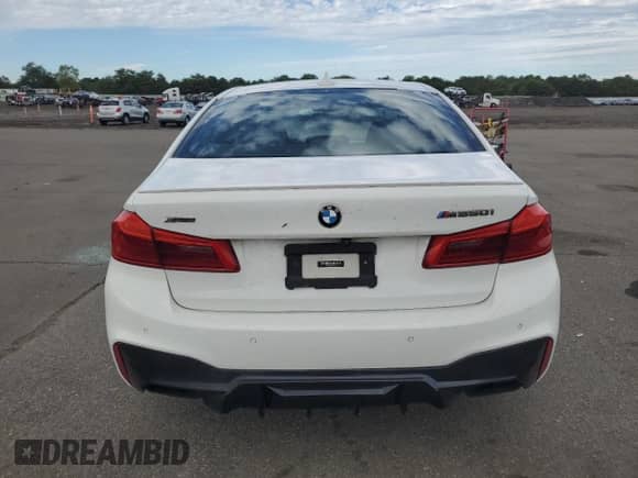 2020 BMW 5 Series M550i xDrive с VIN WBAJS7C00LCD18805, выставлен на аукционе Copart как лот 83802335 с пробегом 81 076 миль миль и Чистый • Clean title. История ставок и продаж доступна на DreamBid. Изображение 6.