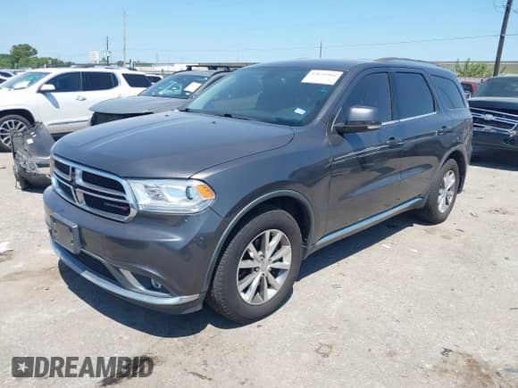 2015 Dodge Durango Limited with VIN 1C4RDHDG1FC906876, listed as a IAAI auction lot 43135944 with 204,306 mi miles and . Bid and sale history available at DreamBid. Image 17.
