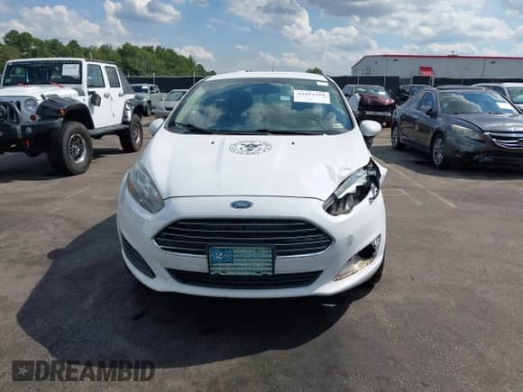 2015 Ford Fiesta S z VIN 3FADP4AJ9FM144900, wystawiony jako IAAI lot #43153351 z przebiegiem 154 259 mil mil oraz . Historia ofert i sprzedaży dostępna na DreamBid. Obrazek 12.
