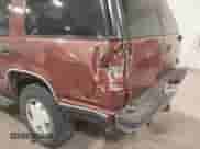 1998 Chevrolet Tahoe with VIN 1GNEK13RXWJ330934, listed as a IAAI auction lot 41431736 with 269,137 mi miles and . Bid and sale history available at DreamBid. Image 6.
