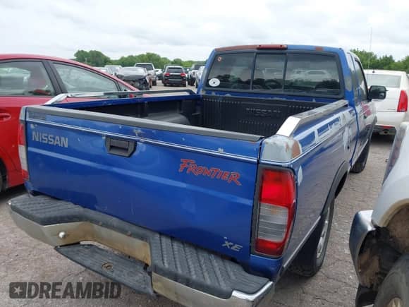 1999 Nissan Frontier XE with VIN 1N6DD26S5XC319085, listed as a IAAI auction lot 42469039 with 59,251 mi miles and . Bid and sale history available at DreamBid. Image 4.