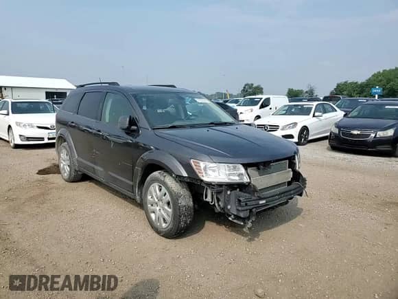 2020 Dodge Journey SE Value with VIN 3C4PDCAB7LT261766, listed as a Copart auction lot 67032355 with 54,961 mi miles and Salvage title. Bid and sale history available at DreamBid. Image 14.