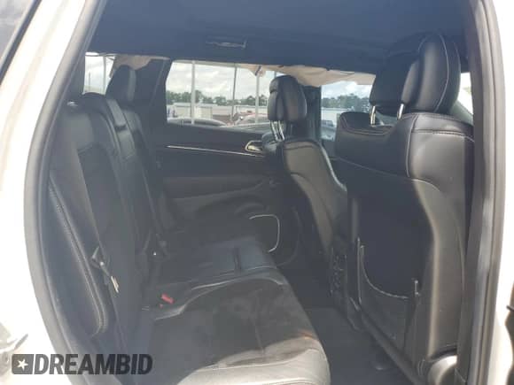 2014 Jeep Grand Cherokee SRT-8 z VIN 1C4RJFDJ2EC242210, wystawiony jako Copart lot #60677855 z przebiegiem 68 050 mil mil oraz Szkoda całkowita • Salvage title. Historia ofert i sprzedaży dostępna na DreamBid. Obrazek 11.