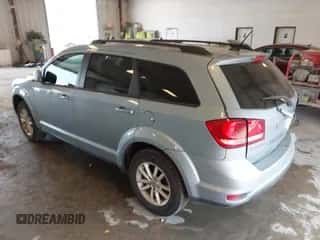 2013 Dodge Journey SXT with VIN 3C4PDCBB8DT558514, listed as a IAAI auction lot 42915042 with 121,870 mi miles and . Bid and sale history available at DreamBid. Image 3.