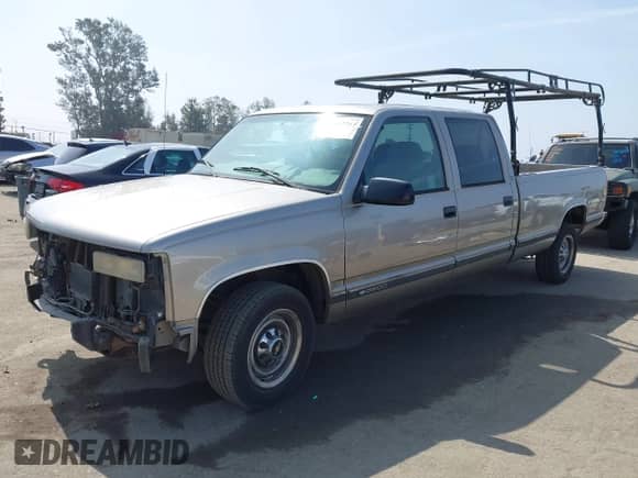 2000 Chevrolet Silverado 3500 z VIN 1GCGC33J0YF423603, wystawiony jako IAAI lot #42442765 z przebiegiem 116 758 mil mil oraz . Historia ofert i sprzedaży dostępna na DreamBid. Obrazek 18.