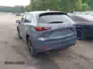 2022 Mazda CX-5 S Preferred z VIN JM3KFBCM9N0542679, wystawiony jako IAAI lot #42107215 z przebiegiem 57 018 mil mil oraz . Historia ofert i sprzedaży dostępna na DreamBid. Obrazek 3.