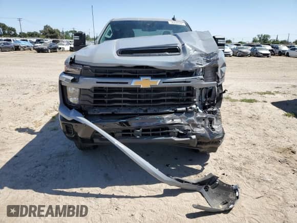 2025 Chevrolet Silverado 2500 with VIN 2GC4KME7XS1122705, listed as a Copart auction lot 56422895 with 7,276 mi miles and Salvage title. Bid and sale history available at DreamBid. Image 5.