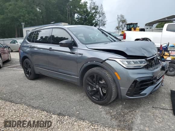 2023 Volkswagen Tiguan SE R-Line Black с VIN 3VVCB7AX6PM112175, выставлен на аукционе Copart как лот 66231495 с пробегом 27 403 миль миль и Списание • Salvage title. История ставок и продаж доступна на DreamBid. Изображение 4.