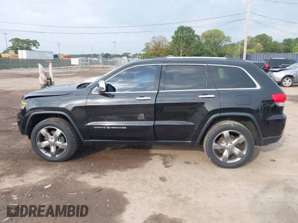 2014 Jeep Grand Cherokee Limited z VIN 1C4RJFBG6EC589188, wystawiony jako IAAI lot #43290881 z przebiegiem 148 318 mil mil oraz . Historia ofert i sprzedaży dostępna na DreamBid. Obrazek 14.