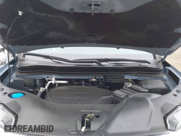 2022 Honda Pilot Touring 7-Passenger z VIN 5FNYF6H68NB056077, wystawiony jako IAAI lot #42357338 z przebiegiem 18 193 mil mil oraz . Historia ofert i sprzedaży dostępna na DreamBid. Obrazek 10.