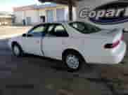 1999 Toyota Camry LE z VIN 4T1BG22K7XU900892, wystawiony jako Copart lot #85856625 z przebiegiem 249 519 mil mil oraz Szkoda całkowita • Salvage title. Historia ofert i sprzedaży dostępna na DreamBid. Obrazek 2.