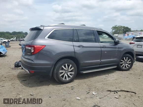 2022 Honda Pilot EX-L with VIN 5FNYF6H57NB003510, listed as a Copart auction lot 62173115 with 30,751 mi miles and Salvage title. Bid and sale history available at DreamBid. Image 3.