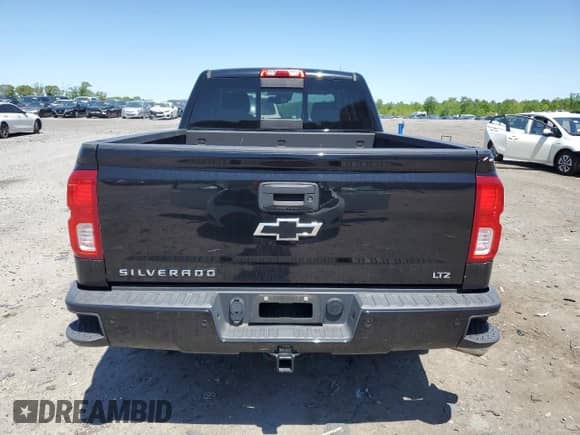 2017 Chevrolet Silverado 1500 LTZ with VIN 1GCVKSEC5HZ149848, listed as a Copart auction lot 54541825 with 104,291 mi miles and Salvage title. Bid and sale history available at DreamBid. Image 6.