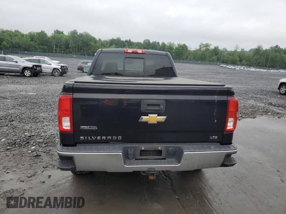 2017 Chevrolet Silverado 1500 LTZ with VIN 1GCVKSEC0HZ323194, listed as a Copart auction lot 61387145 with 64,538 mi miles and Salvage title. Bid and sale history available at DreamBid. Image 6.