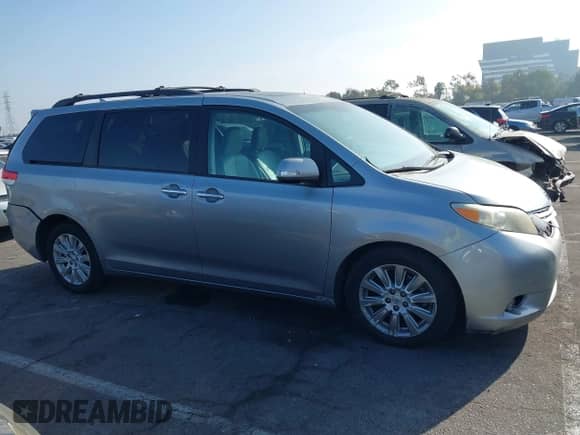 2013 Toyota Sienna XLE AAS with VIN 5TDYK3DC0DS360388, listed as a IAAI auction lot 41163681 with 146,920 mi miles and . Bid and sale history available at DreamBid. Image 14.