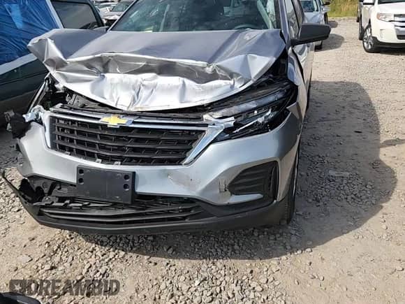 2024 Chevrolet Equinox LS z VIN 3GNAXSEG3RL148300, wystawiony jako Copart lot #71368155 z przebiegiem 27 356 mil mil oraz Szkoda całkowita • Salvage title. Historia ofert i sprzedaży dostępna na DreamBid. Obrazek 14.