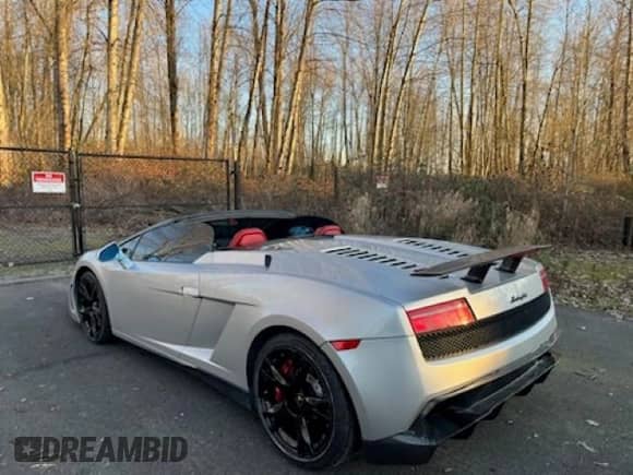 2013 Lamborghini Gallardo with VIN ZHWGU6BZ7DLA12811, listed as a Copart auction lot 42301395 with 35,388 mi miles and Salvage title. Bid and sale history available at DreamBid. Image 3.