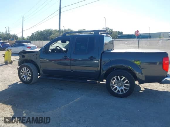 2010 Nissan Frontier SE z VIN 1N6AD0ERXAC434004, wystawiony jako IAAI lot #43485906 z przebiegiem 202 739 mil mil oraz . Historia ofert i sprzedaży dostępna na DreamBid. Obrazek 15.