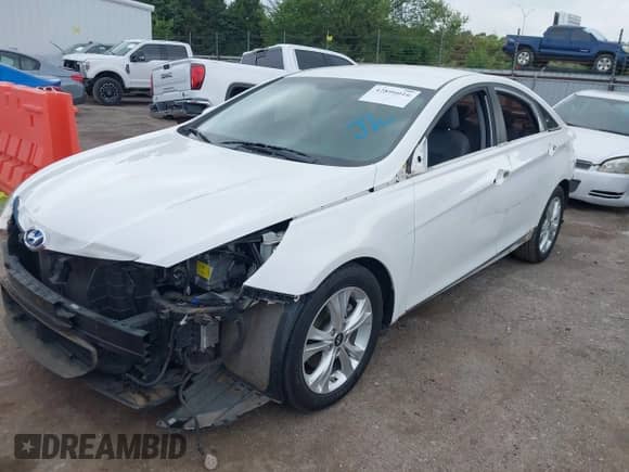 2012 Hyundai Sonata Hybrid with VIN KMHEC4A42CA059809, listed as a IAAI auction lot 42896016 with Not provided miles and . Bid and sale history available at DreamBid. Image 2.