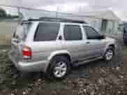 2003 Nissan Pathfinder SE z VIN JN8DR09Y83W825855, wystawiony jako Copart lot #57697885 z przebiegiem 132 050 mil mil oraz Szkoda całkowita • Salvage title. Historia ofert i sprzedaży dostępna na DreamBid. Obrazek 3.
