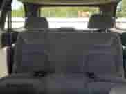 2000 Dodge Caravan SE z VIN 2B4GP45R0YR850038, wystawiony jako Copart lot #82138045 z przebiegiem 173 111 mil mil oraz Czysty tytuł • Clean title. Historia ofert i sprzedaży dostępna na DreamBid. Obrazek 10.