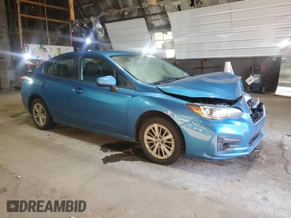 2017 Subaru Impreza Premium with VIN 4S3GKAB69H3610733, listed as a Copart auction lot 71029415 with 152,218 mi miles and Salvage title. Bid and sale history available at DreamBid. Image 4.