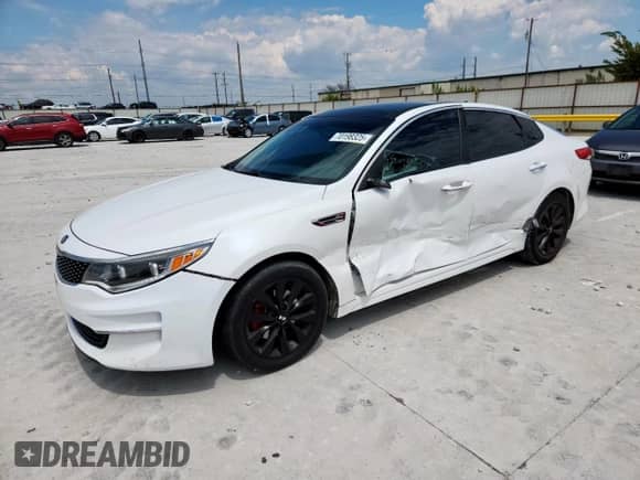 2016 Kia Optima EX с VIN 5XXGU4L30GG054701, выставлен на аукционе Copart как лот 70198325 с пробегом 122 302 миль миль и Списание • Salvage title. История ставок и продаж доступна на DreamBid. Изображение 1.