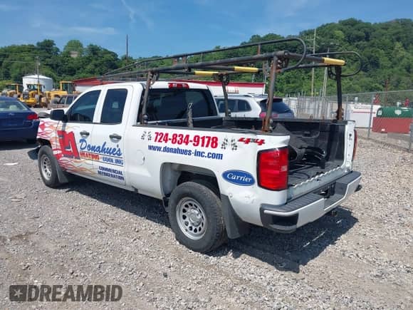 2018 Chevrolet Silverado 1500 Custom with VIN 1GCVKPEC1JZ203519, listed as a IAAI auction lot 42449539 with 104,063 mi miles and . Bid and sale history available at DreamBid. Image 3.