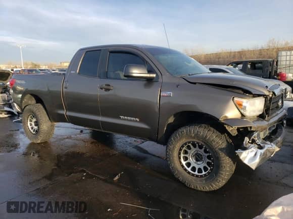 2009 Toyota Tundra SR5 с VIN 5TFBV54199X092840, выставлен на аукционе Copart как лот 87064614 с пробегом 184 106 миль миль и Списание • Salvage title. История ставок и продаж доступна на DreamBid. Изображение 4.
