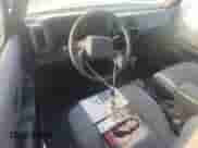 1993 Nissan Pathfinder LE с VIN JN8HD17S1PW141417, выставлен на аукционе Copart как лот 76170254 с пробегом 200 701 миль миль и На запчасти • Non repairable. История ставок и продаж доступна на DreamBid. Изображение 8.