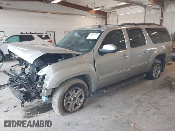 2009 Chevrolet Suburban 2LT z VIN 1GNFK26369R240705, wystawiony jako IAAI lot #43364816 z przebiegiem Nie podano mil oraz . Historia ofert i sprzedaży dostępna na DreamBid. Obrazek 2.