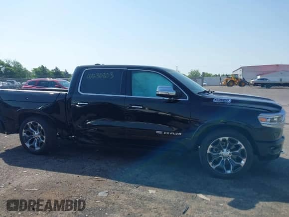 2020 Ram 1500 Longhorn with VIN 1C6SRFKT5LN117418, listed as a IAAI auction lot 42236803 with 96,338 mi miles and . Bid and sale history available at DreamBid. Image 13.