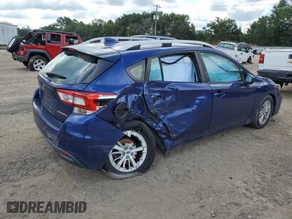 2018 Subaru Impreza Premium with VIN 4S3GTAD62J3714075, listed as a Copart auction lot 68227595 with 148,222 mi miles and Salvage title. Bid and sale history available at DreamBid. Image 3.