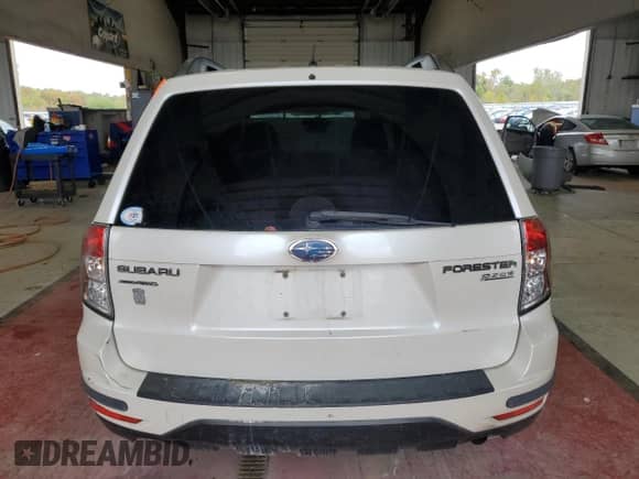 2010 Subaru Forester X Premium with VIN JF2SH6CC1AH732684, listed as a Copart auction lot 83993475 with Not provided miles and Salvage title. Bid and sale history available at DreamBid. Image 6.
