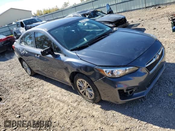 2017 Subaru Impreza Premium with VIN 4S3GKAD67H3618763, listed as a Copart auction lot 86705595 with 98,497 mi miles and Salvage title. Bid and sale history available at DreamBid. Image 4.