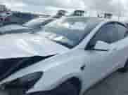 2023 Tesla Model Y Long Range с VIN 7SAYGDEE2PA071402, выставлен на аукционе IAAI как лот 42729170 с пробегом 31 865 миль миль и . История ставок и продаж доступна на DreamBid. Изображение 6.