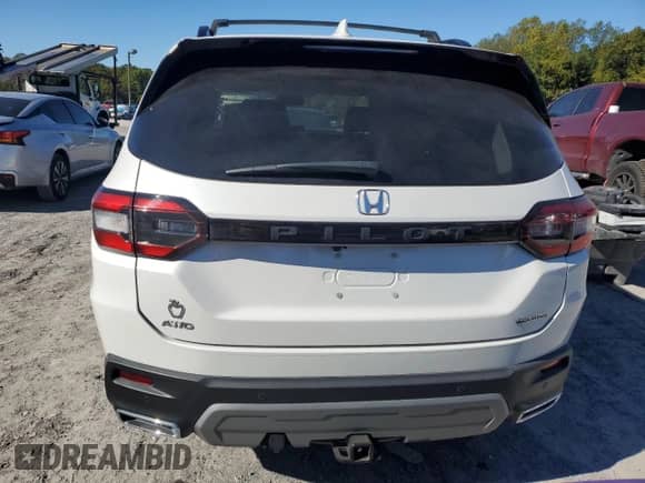 2023 Honda Pilot Touring с VIN 5FNYG1H70PB014840, выставлен на аукционе Copart как лот 85300455 с пробегом 32 981 миль миль и Списание • Salvage title. История ставок и продаж доступна на DreamBid. Изображение 6.