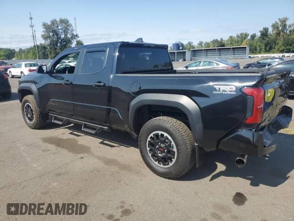 2024 Toyota Tacoma SR5 with VIN 3TMLB5JN9RM036603, listed as a Copart auction lot 80685075 with 4,301 mi miles and Salvage title. Bid and sale history available at DreamBid. Image 2.