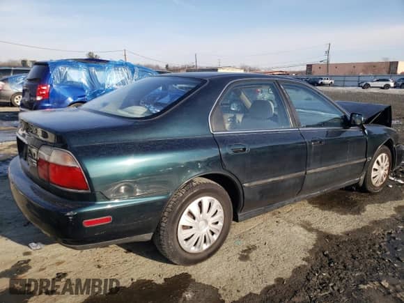 1996 Honda Accord with VIN 1HGCE6644TA028850, listed as a Copart auction lot 42564835 with 116,354 mi miles and Salvage title. Bid and sale history available at DreamBid. Image 3.